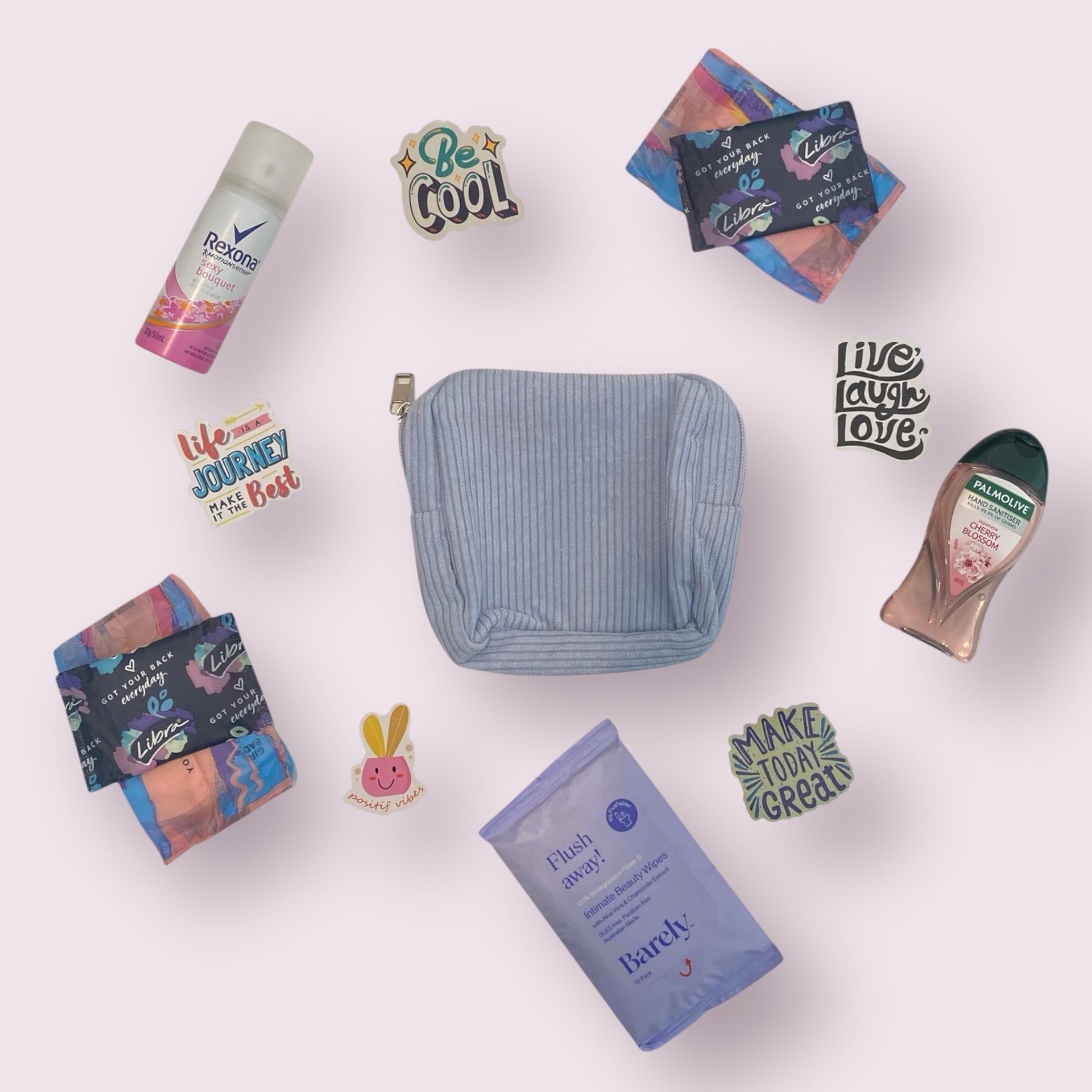 Purse, mini spray, pads, hand sanitiser and flushable wipes