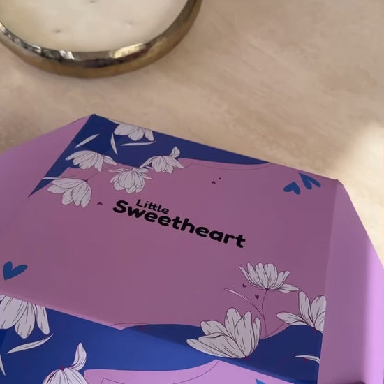 Video of Simone Anderson doing an unboxing of our gift box.